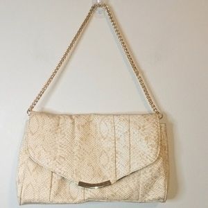 NWOT charming charming faux Print snake bag with good hardware.